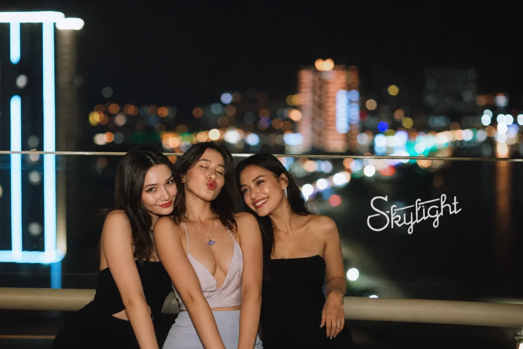 Group photo with Nha Trang city lights during Girls Night Out at Skylight