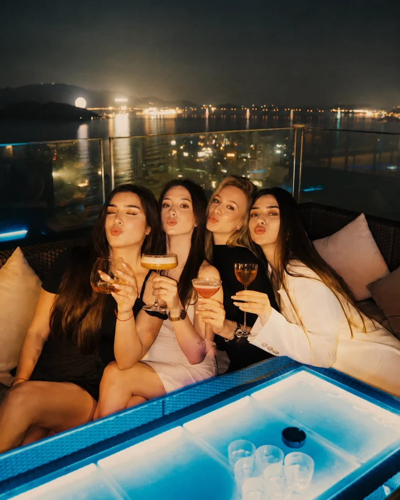 Friends enjoying cocktails during Girls Night Out Nha Trang at Skylight