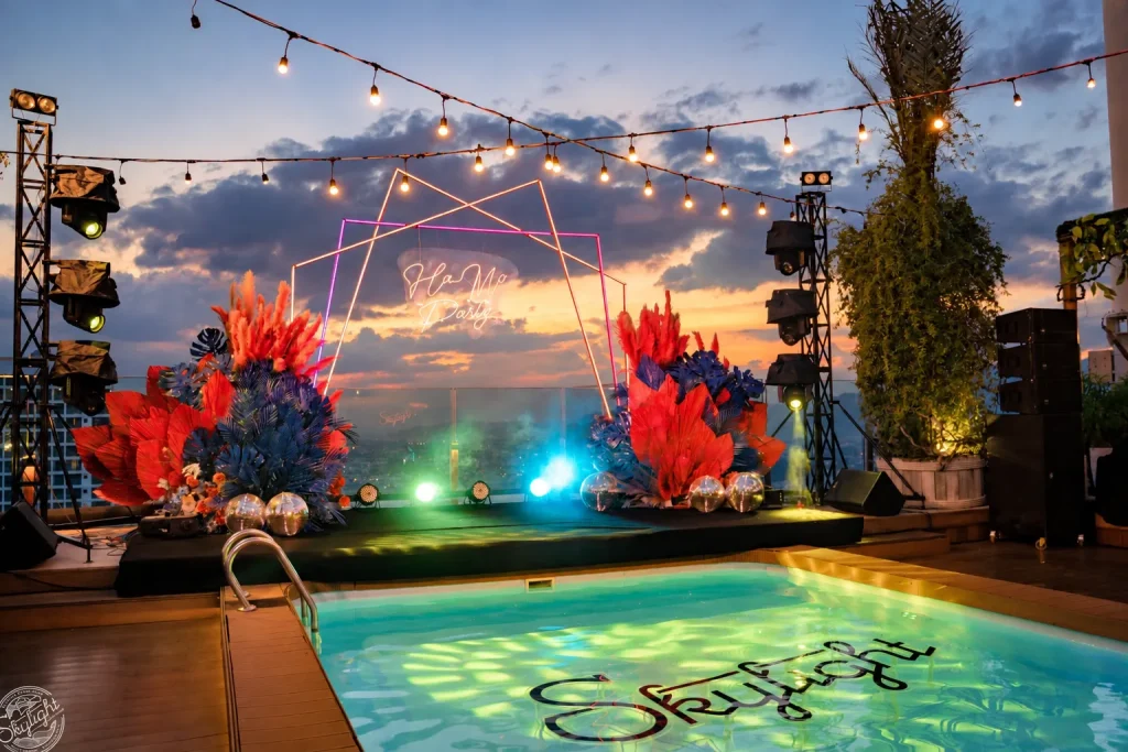 Year-End Party Nha Trang - stage and backdrop at sunset by the pool at Lá Kitchen, Skylight