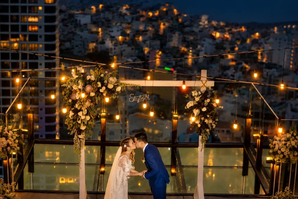 Nha Trang wedding as the city lights come on